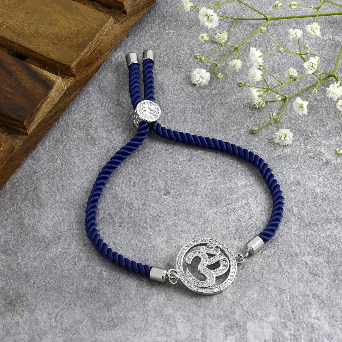 Aum Om Silver Blue American Diamond Adjustable Thread Bracelet